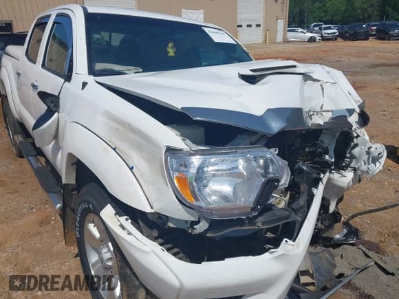 ✅ 2015 Toyota Tacoma PreRunner • VIN: 5TFKU4HN3FX007156 • Lot: 42460345. Listed on IAAI with 123,563 mi. Free auction sales archive from the USA and detailed vehicle history report at DreamBid. Image 17.