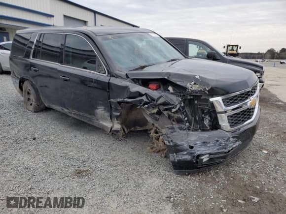✅ 2016 Chevrolet Tahoe Commercial • VIN: 1GNLCDEC1GR291328 • Lot: 87735875. Listed on Copart with 113,746 mi. Free auction sales archive from the USA and detailed vehicle history report at DreamBid. Image 4.