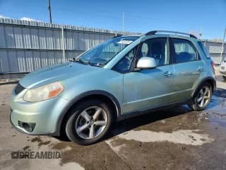 ✅ 2009 Suzuki SX4 Touring AWD • VIN: JS2YB417X96202988 • Lot: 91433735. Wystawiony na Copart z przebiegiem 94 958 mil. Bezpłatny archiwum sprzedaży aukcyjnych z USA i szczegółowy raport historii pojazdu na DreamBid. Zdjęcie 1.