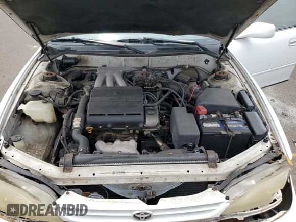 ✅ 1995 Toyota Camry LE • VIN: JT2GK12E2S0107912 • Лот: 65865134. Опубликован ранее на Copart с пробегом 96 339 миль. Бесплатный доступ к архиву аукционных продаж из США и подробный отчёт об истории автомобиля на DreamBid. Изображение 11.