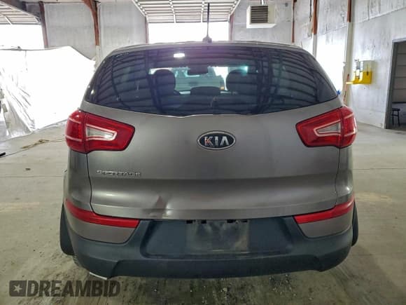 ✅ 2012 Kia Sportage LX • VIN: KNDPB3A26C7198136 • Lot: 94096325. Listed on Copart with 181,614 mi. Free auction sales archive from the USA and detailed vehicle history report at DreamBid. Image 6.
