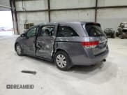 ✅ 2014 Honda Odyssey EX-L • VIN: 5FNRL5H64EB041390 • Lot: 92021555. Listed on Copart with 201,147 mi. Free auction sales archive from the USA and detailed vehicle history report at DreamBid. Image 2.