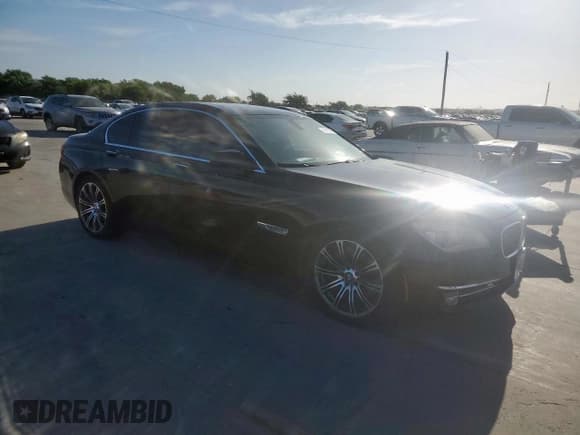✅ 2015 BMW 7 Series 750i xDrive • VIN: WBAYB6C50FD965723 • Lot: 62612605. Listed on Copart with 158,893 mi. Free auction sales archive from the USA and detailed vehicle history report at DreamBid. Image 4.