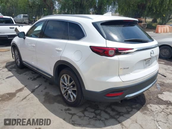 ✅ 2019 Mazda CX-9 Grand Touring • VIN: JM3TCADY3K0307375 • Lot: 42159412. Wystawiony na IAAI z przebiegiem 121 265 mil. Bezpłatny archiwum sprzedaży aukcyjnych z USA i szczegółowy raport historii pojazdu na DreamBid. Zdjęcie 3.