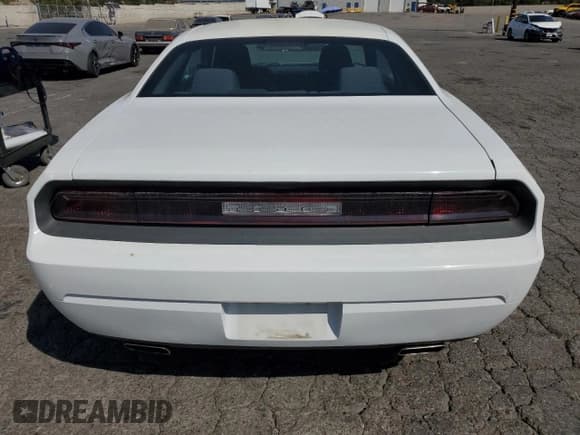 ✅ 2014 Dodge Challenger SXT • VIN: 2C3CDYAG6EH313038 • Lot: 74152354. Wystawiony na Copart z przebiegiem 209 811 mil. Bezpłatny archiwum sprzedaży aukcyjnych z USA i szczegółowy raport historii pojazdu na DreamBid. Zdjęcie 6.