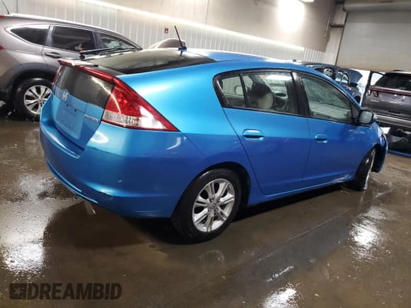 ✅ 2010 Honda Insight EX • VIN: JHMZE2H73AS036498 • Lot: 93460445. Listed on Copart with 134,324 mi. Free auction sales archive from the USA and detailed vehicle history report at DreamBid. Image 3.