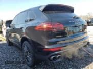 ✅ 2017 Porsche Cayenne S E-Hybrid • VIN: WP1AE2A22HLA74465 • Lot: 46676475. Listed on Copart with 144,112 mi. Free auction sales archive from the USA and detailed vehicle history report at DreamBid. Image 2.