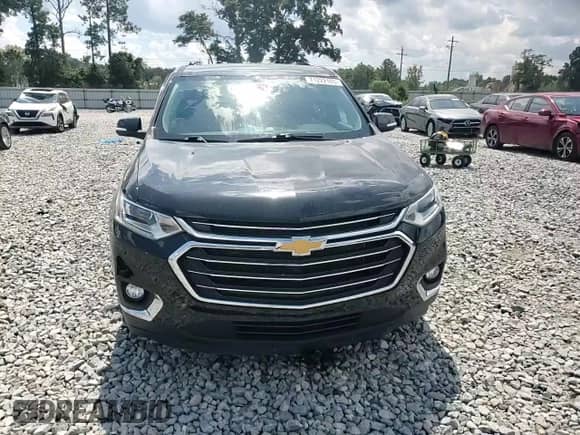 2021 Chevrolet Traverse LT Cloth z VIN 1GNERGKW8MJ253757, wystawiony jako Copart lot #71222165 z przebiegiem 87 679 mil mil oraz Szkoda całkowita • Salvage title. Historia ofert i sprzedaży dostępna na DreamBid. Obrazek 14.