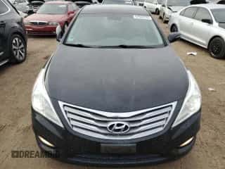 2013 Hyundai Azera z VIN KMHFH4JG6DA233074, wystawiony jako Copart lot #87653725 z przebiegiem 150 481 mil mil oraz Szkoda całkowita • Salvage title. Historia ofert i sprzedaży dostępna na DreamBid. Obrazek 5.
