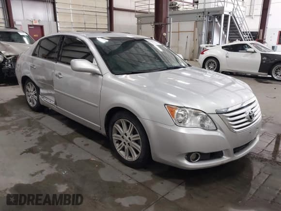 ✅ 2008 Toyota Avalon Touring • VIN: 4T1BK36B48U261693 • Лот: 43566376. Опубликован ранее на IAAI с пробегом 112 153 миль. Бесплатный доступ к архиву аукционных продаж из США и подробный отчёт об истории автомобиля на DreamBid. Изображение 1.