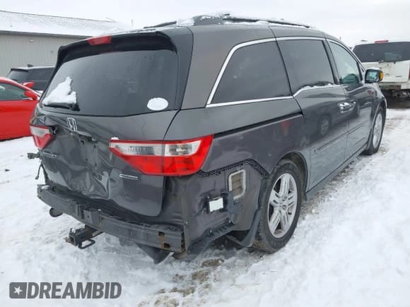 ✅ 2012 Honda Odyssey Touring • VIN: 5FNRL5H95CB049148 • Lot: 43831103. Listed on IAAI with 288,928 mi. Free auction sales archive from the USA and detailed vehicle history report at DreamBid. Image 4.