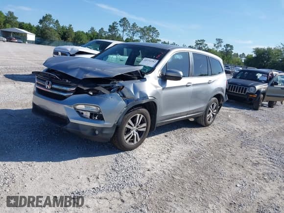 ✅ 2017 Honda Pilot EX-L • VIN: 5FNYF5H7XHB027767 • Lot: 42332282. Listed on IAAI with 50,611 mi. Free auction sales archive from the USA and detailed vehicle history report at DreamBid. Image 2.