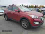 2014 Hyundai Santa Fe with VIN 5XYZUDLB0EG151762, listed as a Copart auction lot 91348525 with 135,823 mi miles and Salvage title. Bid and sale history available at DreamBid. Image 4.