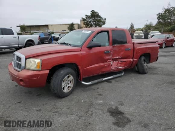 2007 Dodge Dakota SLT с VIN 1D7HE48K07S173426, выставлен на аукционе Copart как лот 71843254 с пробегом 205 125 миль миль и Списание • Salvage title. История ставок и продаж доступна на DreamBid. Изображение 1.