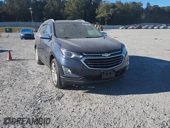 ✅ 2018 Chevrolet Equinox Premier • VIN: 3GNAXMEV5JL105706 • Lot: 82513825. Listed on Copart with 77,883 mi. Free auction sales archive from the USA and detailed vehicle history report at DreamBid. Image 14.