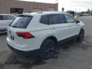 ✅ 2022 Volkswagen Tiguan SE • VIN: 3VV3B7AX2NM020185 • Lot: 42956464. Listed on IAAI with 31,023 mi. Free auction sales archive from the USA and detailed vehicle history report at DreamBid. Image 4.