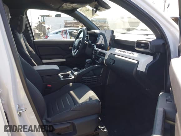✅ 2024 Toyota Tacoma TRD Sport Hybrid • VIN: 3TYLC5LN3RT001392 • Lot: 42401518. Listed on IAAI with 3,310 mi. Free auction sales archive from the USA and detailed vehicle history report at DreamBid. Image 5.