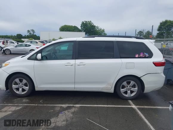 ✅ 2015 Toyota Sienna LE AAS • VIN: 5TDKK3DC9FS576023 • Lot: 42395573. Listed on IAAI with 120,752 mi. Free auction sales archive from the USA and detailed vehicle history report at DreamBid. Image 14.
