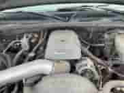 2004 Chevrolet Silverado 1500 z VIN 1GCEK19T74E305457, wystawiony jako Copart lot #59048185 z przebiegiem 261 976 mil mil oraz Czysty tytuł • Clean title. Historia ofert i sprzedaży dostępna na DreamBid. Obrazek 11.