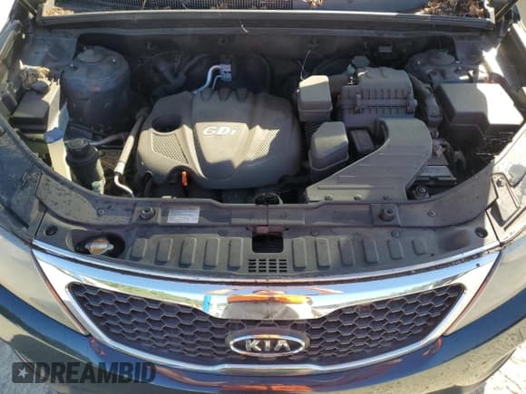 ✅ 2013 Kia Sorento LX • VIN: 5XYKTCA61DG310050 • Lot: 82224215. Listed on Copart with 172,337 mi. Free auction sales archive from the USA and detailed vehicle history report at DreamBid. Image 12.
