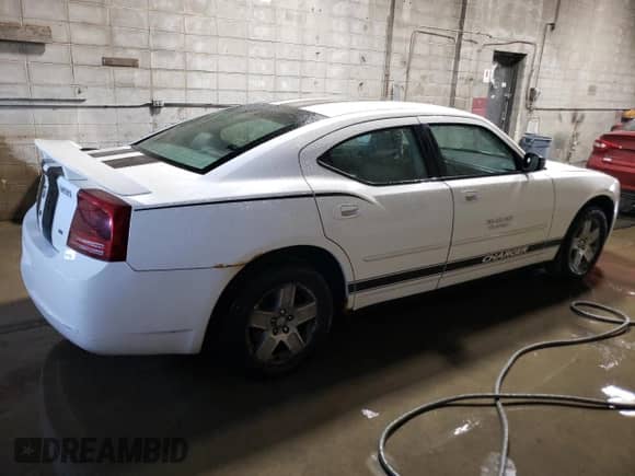2007 Dodge Charger с VIN 2B3KA43G77H838233, выставлен на аукционе Copart как лот 74908684 с пробегом 151 428 миль миль и Списание • Salvage title. История ставок и продаж доступна на DreamBid. Изображение 3.