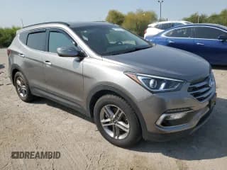 ✅ 2017 Hyundai Santa Fe 2.4L • VIN: 5NMZUDLB2HH028894 • Лот: 70141974. Опубликован ранее на Copart с пробегом 124 839 миль. Бесплатный доступ к архиву аукционных продаж из США и подробный отчёт об истории автомобиля на DreamBid. Изображение 4.