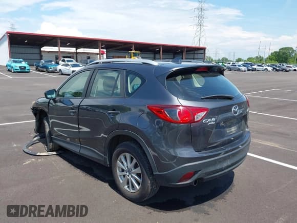 ✅ 2016 Mazda CX-5 Sport • VIN: JM3KE4BY4G0783619 • Lot: 42368512. Listed on IAAI with 115,694 mi. Free auction sales archive from the USA and detailed vehicle history report at DreamBid. Image 3.