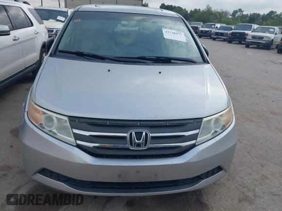 ✅ 2011 Honda Odyssey EX-L • VIN: 5FNRL5H62BB005368 • Lot: 43738477. Listed on IAAI with 207,719 mi. Free auction sales archive from the USA and detailed vehicle history report at DreamBid. Image 12.