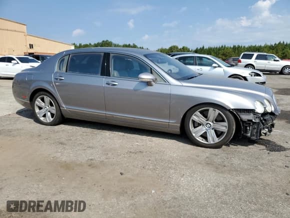 ✅ 2006 Bentley Flying Spur • VIN: SCBBR53W76C031171 • Лот: 80781475. Опубликован ранее на Copart с пробегом 74 951 миль. Бесплатный доступ к архиву аукционных продаж из США и подробный отчёт об истории автомобиля на DreamBid. Изображение 4.