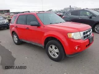 ✅ 2009 Ford Escape XLT • VIN: 1FMCU03739KA29175 • Lot: 43637077. Listed on IAAI with 219,302 mi. Free auction sales archive from the USA and detailed vehicle history report at DreamBid. Image 1.