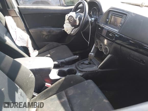 ✅ 2014 Mazda CX-5 Sport • VIN: JM3KE2BE6E0376246 • Lot: 43627211. Listed on IAAI with 129,654 mi. Free auction sales archive from the USA and detailed vehicle history report at DreamBid. Image 5.