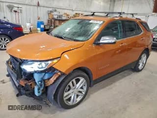 ✅ 2018 Chevrolet Equinox Premier • VIN: 2GNAXWEX9J6199199 • Lot: 93879475. Wystawiony na Copart z przebiegiem 87 660 mil. Bezpłatny archiwum sprzedaży aukcyjnych z USA i szczegółowy raport historii pojazdu na DreamBid. Zdjęcie 1.