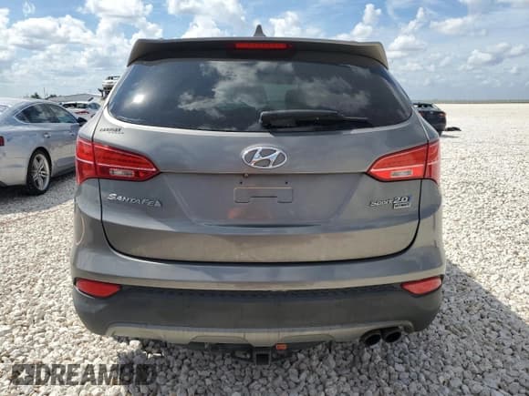 ✅ 2015 Hyundai Santa Fe • VIN: 5XYZW4LA7FG257189 • Лот: 70474313. Опубликован ранее на Copart с пробегом 62 512 миль. Бесплатный доступ к архиву аукционных продаж из США и подробный отчёт об истории автомобиля на DreamBid. Изображение 6.
