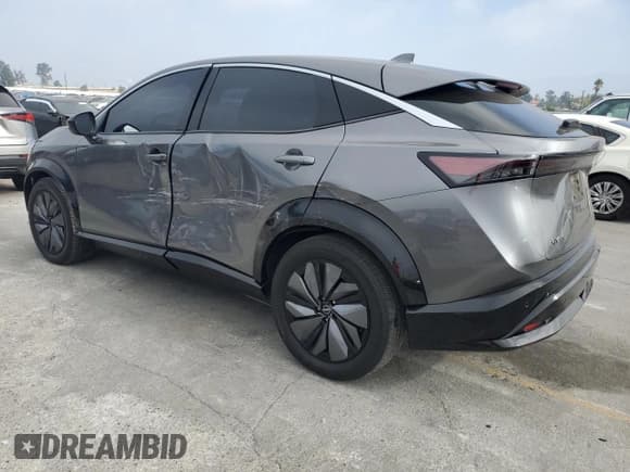 ✅ 2023 Nissan ARIYA Venture+ • VIN: JN1BF0AA3PM410795 • Lot: 84994815. Listed on Copart with 49,709 mi. Free auction sales archive from the USA and detailed vehicle history report at DreamBid. Image 2.