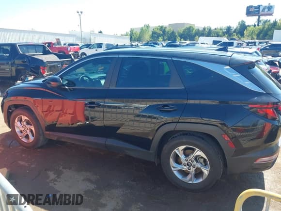 ✅ 2022 Hyundai Tucson SE • VIN: 5NMJA3AE2NH006760 • Lot: 43260173. Wystawiony na IAAI z przebiegiem 75 591 mil. Bezpłatny archiwum sprzedaży aukcyjnych z USA i szczegółowy raport historii pojazdu na DreamBid. Zdjęcie 15.