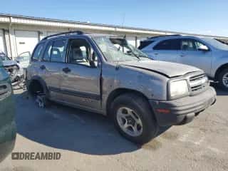 2002 Chevrolet Tracker ZR2 с VIN 2CNBJ734726929573, выставлен на аукционе Copart как лот 70632155 с пробегом 169 116 миль миль и Списание • Salvage title. История ставок и продаж доступна на DreamBid. Изображение 4.