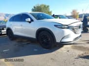 ✅ 2016 Mazda CX-9 Touring • VIN: JM3TCACY9G0108355 • Lot: 43570385. Listed on IAAI with 132,041 mi. Free auction sales archive from the USA and detailed vehicle history report at DreamBid. Image 1.