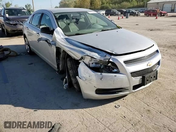 ✅ 2012 Chevrolet Malibu 1LS • VIN: 1G1ZB5E07CF224710 • Lot: 74375084. Listed on Copart with 105,537 mi. Free auction sales archive from the USA and detailed vehicle history report at DreamBid. Image 13.