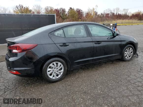 2020 Hyundai Elantra SE z VIN KMHD74LF0LU965079, wystawiony jako Copart lot #90737525 z przebiegiem 125 870 mil mil oraz Czysty tytuł • Clean title. Historia ofert i sprzedaży dostępna na DreamBid. Obrazek 3.