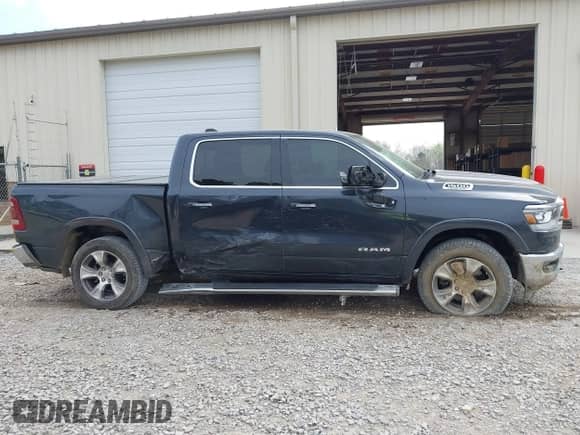 2020 Ram 1500 Laramie с VIN 1C6RREJT1LN105809, выставлен на аукционе IAAI как лот 41891443 с пробегом 102 591 миль миль и . История ставок и продаж доступна на DreamBid. Изображение 13.