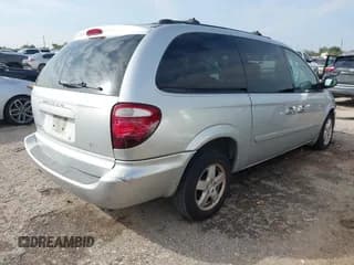 ✅ 2005 Dodge Caravan SXT • VIN: 2D4GP44L55R464259 • Lot: 43537194. Listed on IAAI with 167,006 mi. Free auction sales archive from the USA and detailed vehicle history report at DreamBid. Image 4.
