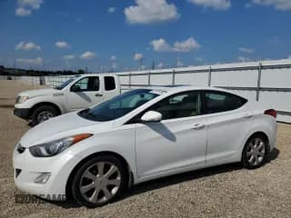 ✅ 2012 Hyundai Elantra GLS • VIN: 5NPDH4AE8CH088217 • Lot: 67177175. Listed on Copart with 138,991 mi. Free auction sales archive from the USA and detailed vehicle history report at DreamBid. Image 1.