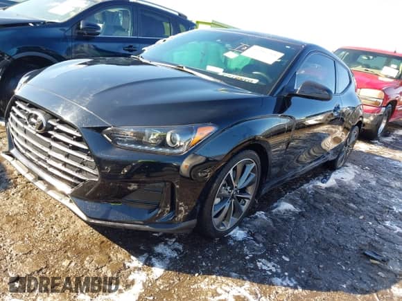 2019 Hyundai Veloster Premium z VIN KMHTG6AF7KU010854, wystawiony jako IAAI lot #41386268 z przebiegiem 87 133 mil mil oraz . Historia ofert i sprzedaży dostępna na DreamBid. Obrazek 17.