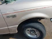 ✅ 1998 Ford Ranger XL • VIN: 1FTYR14XXWTA50370 • Lot: 42484148. Wystawiony na IAAI z przebiegiem 240 000 mil. Bezpłatny archiwum sprzedaży aukcyjnych z USA i szczegółowy raport historii pojazdu na DreamBid. Zdjęcie 18.