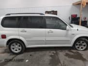 ✅ 2003 Suzuki XL7 Touring • VIN: JS3TX92V034107196 • Lot: 43475119. Wystawiony na IAAI z przebiegiem 96 987 mil. Bezpłatny archiwum sprzedaży aukcyjnych z USA i szczegółowy raport historii pojazdu na DreamBid. Zdjęcie 13.