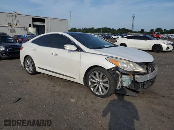 ✅ 2013 Hyundai Azera • VIN: KMHFH4JG4DA330015 • Лот: 62757555. Опубликован ранее на Copart с пробегом 128 339 миль. Бесплатный доступ к архиву аукционных продаж из США и подробный отчёт об истории автомобиля на DreamBid. Изображение 4.