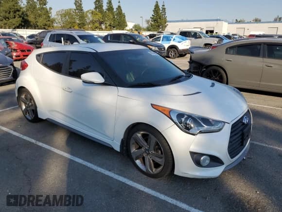 ✅ 2013 Hyundai Veloster Turbo • VIN: KMHTC6AE8DU158906 • Lot: 88074985. Wystawiony na Copart z przebiegiem 183 435 mil. Bezpłatny archiwum sprzedaży aukcyjnych z USA i szczegółowy raport historii pojazdu na DreamBid. Zdjęcie 4.