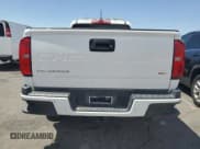 ✅ 2021 Chevrolet Colorado 4WD LT • VIN: 1GCHTCEN3M1152628 • Лот: 61036145. Опубликован ранее на Copart с пробегом 133 641 миль. Бесплатный доступ к архиву аукционных продаж из США и подробный отчёт об истории автомобиля на DreamBid. Изображение 6.