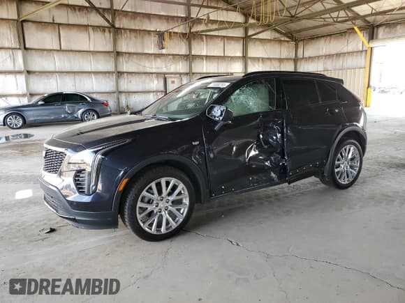 ✅ 2023 Cadillac XT4 AWD Sport • VIN: 1GYFZFR45PF103280 • Lot: 71688255. Listed on Copart with 33,221 mi. Free auction sales archive from the USA and detailed vehicle history report at DreamBid. Image 1.