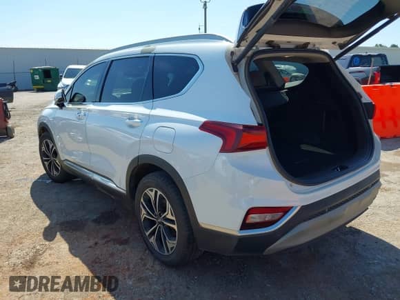 2019 Hyundai Santa Fe Limited с VIN 5NMS5CAA8KH014525, выставлен на аукционе IAAI как лот 42819215 с пробегом 90 087 миль миль и . История ставок и продаж доступна на DreamBid. Изображение 3.